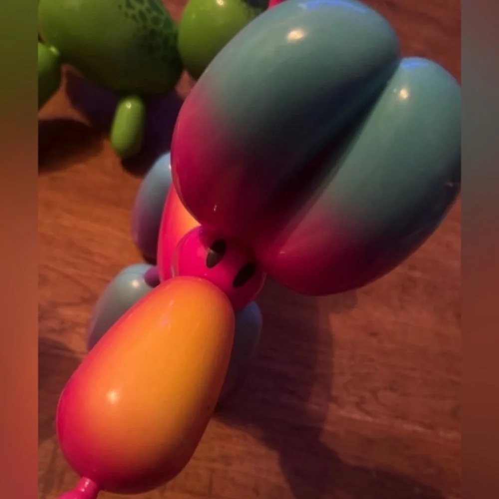 Squeakies interactive balloon animal rainbow dog